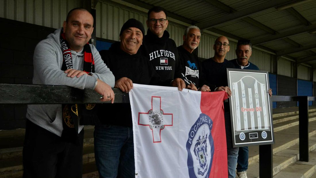 Dale Exiles Malta members with their flag and a signed shirt