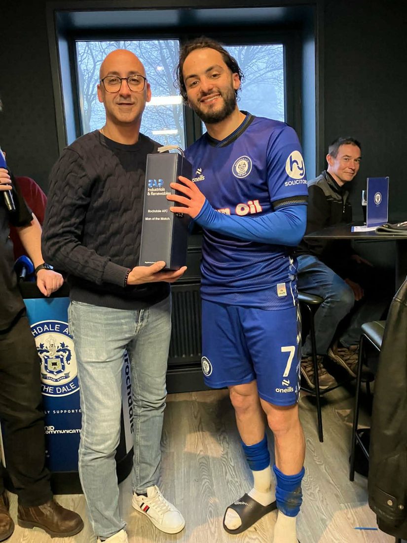 Dale Exiles Malta presenting a man of the match award